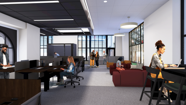 Open coworking office with people working and collaborating in a bright, modern workspace.